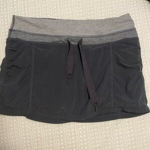 Lululemon size 4 golf/tennis skirt. Gray.